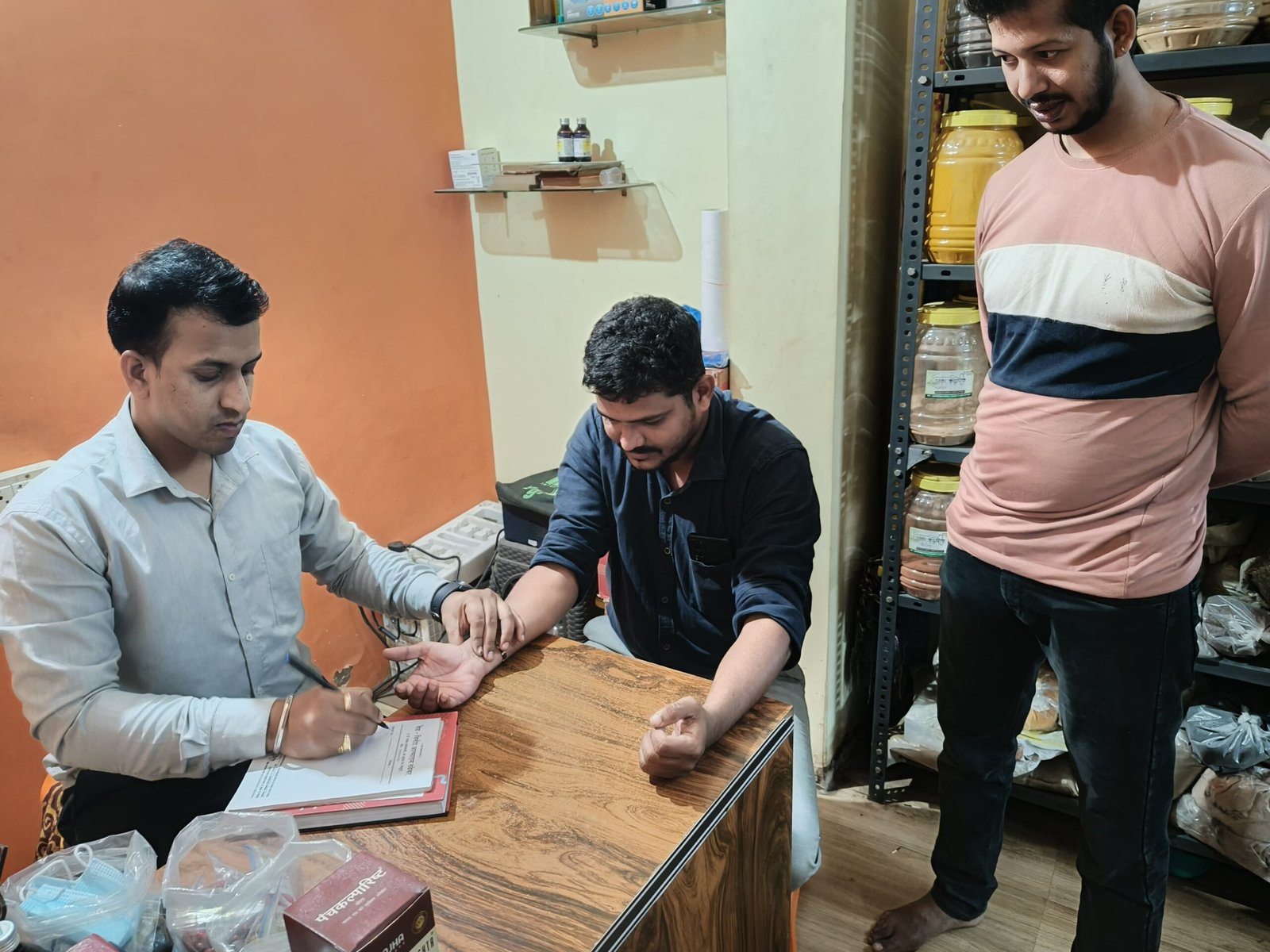 Photo Of Doctor While Performing Consultancy