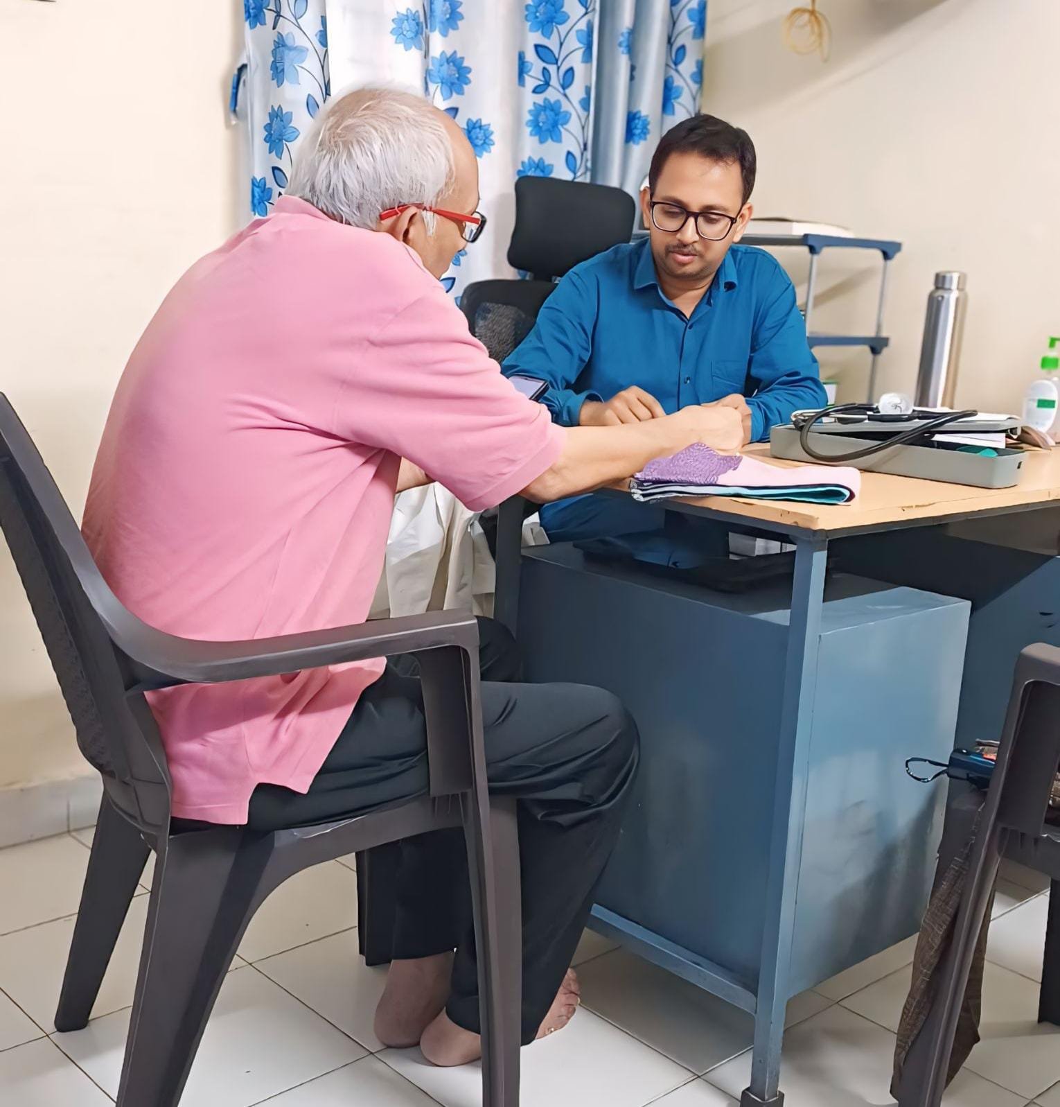 Photo Of Doctor While Performing Consultancy